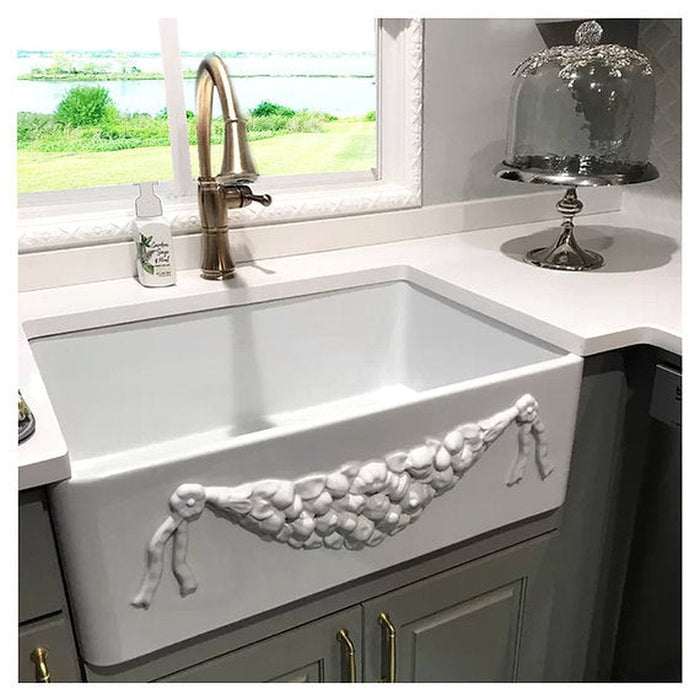 Nantucket Sinks Farmhouse Fireclay Apron Sink with an embossed decorative design